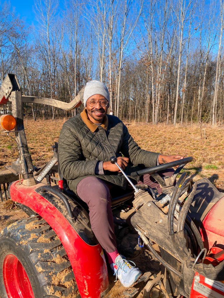 self reliant meaning (man on tractor)